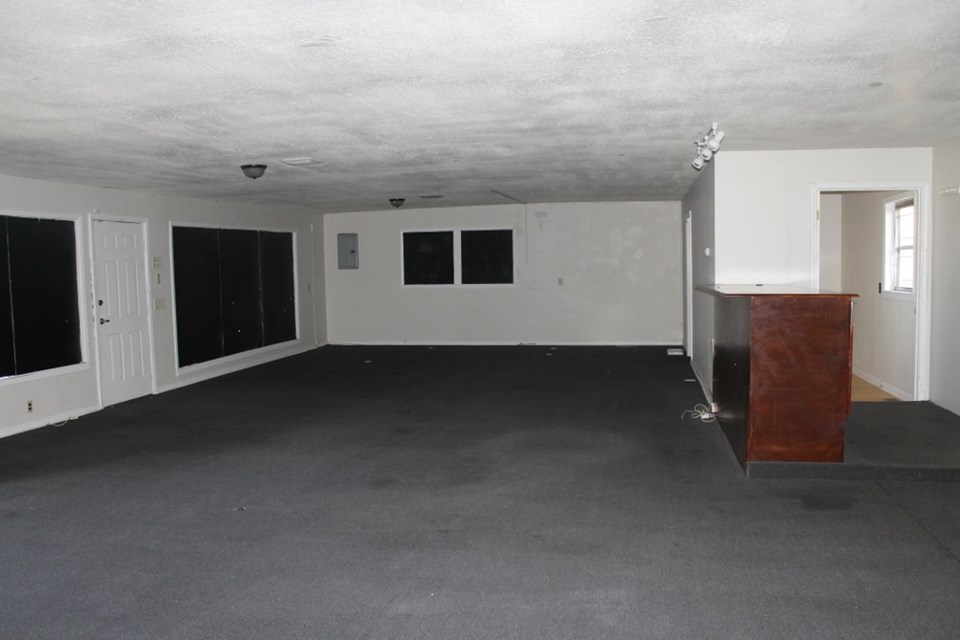 hardwood under carpet on main level